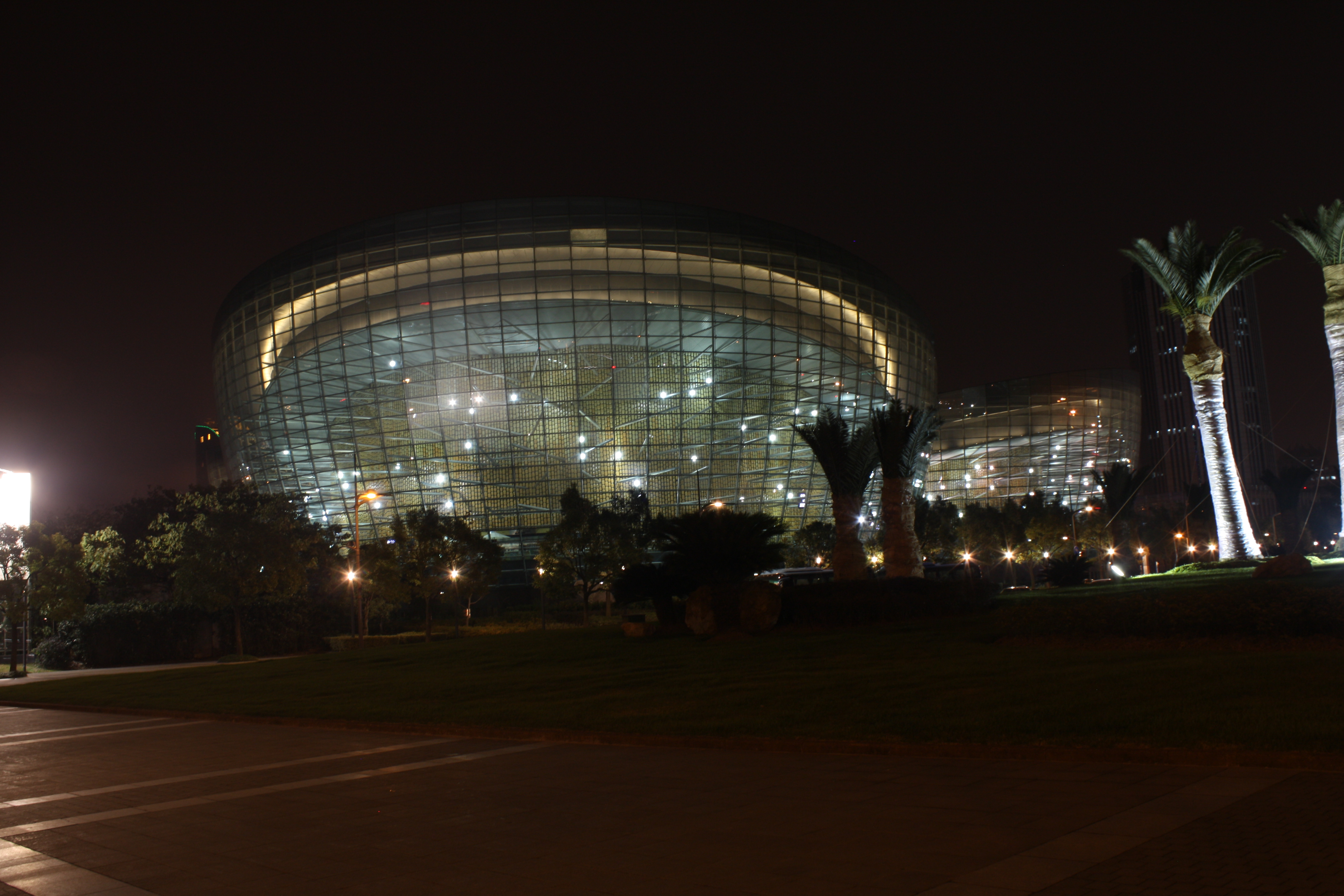 Shanghai Oriental Art Center illuminated at night